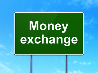 Currency concept: Money Exchange on road sign background