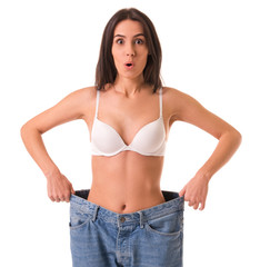 Fototapeta premium Girl showing weight loss