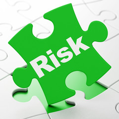 Finance concept: Risk on puzzle background