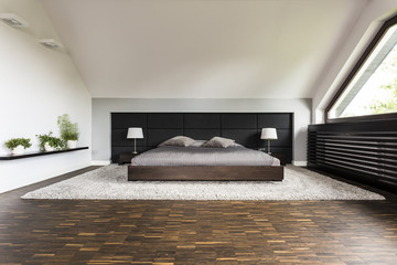 Fototapeta premium Big bed in a bedroom