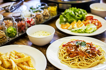 Italian food - Spaghetti bolognese with various ingredients