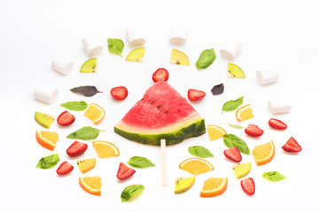 watermelon, strawberry, leaves, kiwi and orange isolated on white