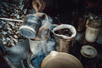Phan Dinh Phung street, Ho Chi Minh city, Viet Nam - FEB 7: Unidentified woman with private business at home by cafe store. Coffee is favorite drink at Vietnam