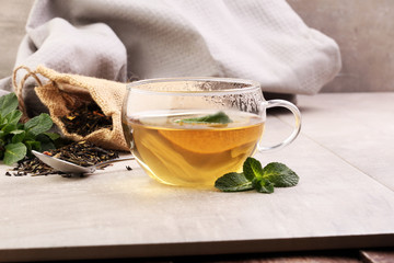 Tea. Herbal tea. Mint leaf. Tea in a glass cup, mint leaves, dri