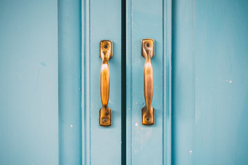 Closed vintage handle on wooden door