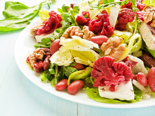 Salad with walnuts and various herbs