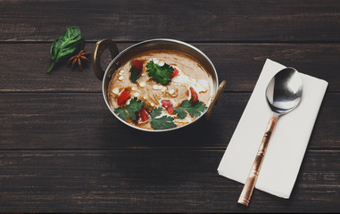 Vegan and vegetarian indian cuisine dish, spicy lentil dahl soup