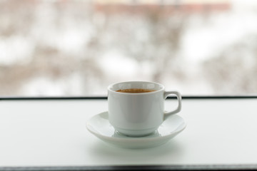 coffee isolated on a white wooden table