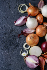 Variety of whole and sliced onion