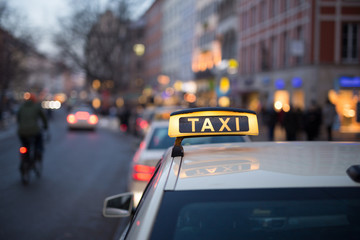 Taxi sign on car roof