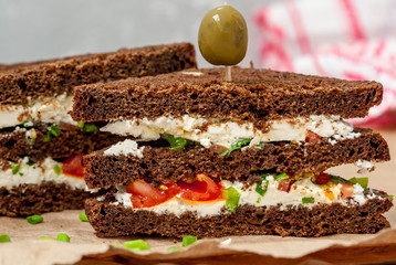 Sandwiches with healthy rye bread, feta and green onions. Love for a healthy food concept