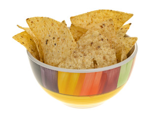 Colorful bowl filled with tortilla chips isolated on a white background.