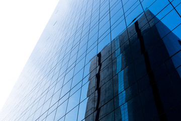 Fototapeta na wymiar Backgrounds of Modern blue architecture with reflection
