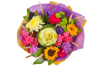 Bright buketny composition from fresh flowers, the white isolated background