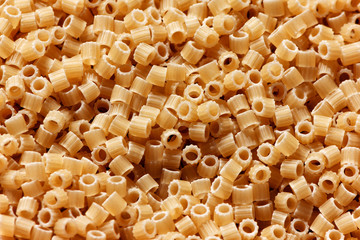 Italian round pasta macro close up background