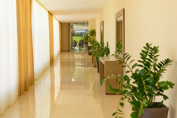 deserted lobby of a modern building in beige tones