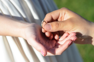 Wedding ring in the palm of your hand