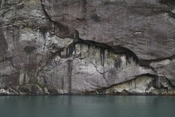 Sheer rocks faces along the Norwegian Fjords - Powered by Adobe