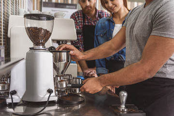 Man learning how to make coffee