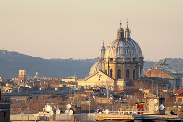 Fototapeta na wymiar View of Rome roofs: San Carlo ai Catinari Dome, Sant'Andrea dell