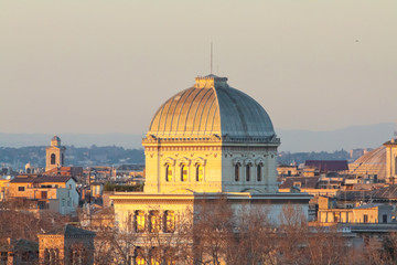 Fototapeta na wymiar View of Rome roofs: Towerbell of Saint Augustine Church, jewish