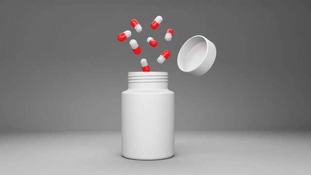 pills droping from a bottle on greay background animation for use in presentations, education manuals, design, etc