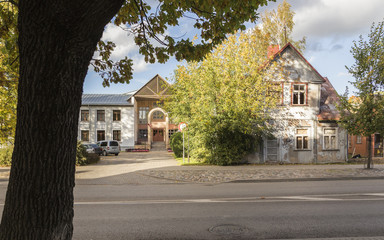 Fototapeta na wymiar Old village house in small town. autumn