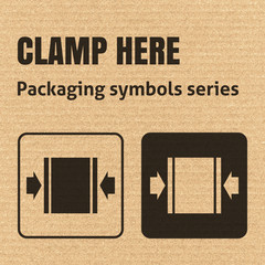 CLAMP HERE packaging symbol on a corrugated cardboard background. For use on cardboard boxes, packages and parcels. EPS10 vector illustration