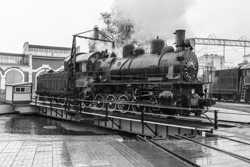 Naklejka premium old black steam locomotive in Russia