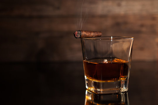 Cigar and glass of whiskey