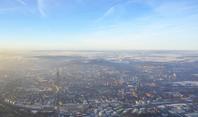 Fototapeta na wymiar Aerial view of foggy Ulm, south germany on a sunny winter day