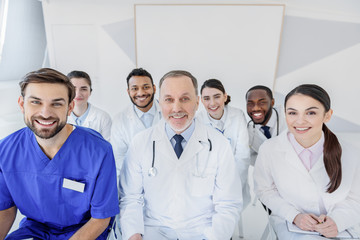 Fototapeta na wymiar Cheerful doctors enjoying their work