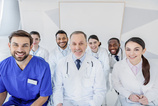 Cheerful doctors enjoying their work