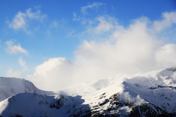 Fototapeta na wymiar Winter mountain landscape. Mountain climbing snow