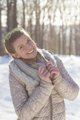 Fototapeta premium Portrait of beautiful girl on snow