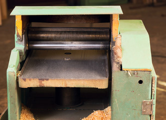 Carpenter tools on wooden table with sawdust. Circular Saw.