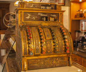 Antique metal cash register. Antique calculator machine