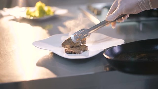 Master chief making meat's dish presentation in 4K