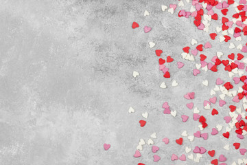 Pink, white and red hearts on a light background. Top view, copy