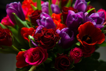 Red roses and purple tulips