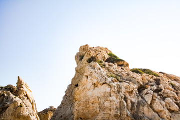 Fototapeta na wymiar Rock on a background of blue sky