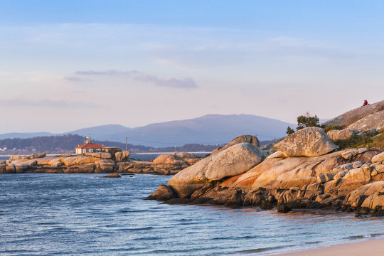 Lighthouse on coastal rocks