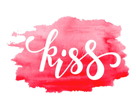 Kiss. Hand drawn creative calligraphy and brush pen lettering on abstract watercolor stein drop.