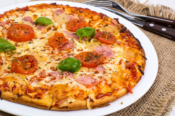 Pizza Prosciutto on white boards