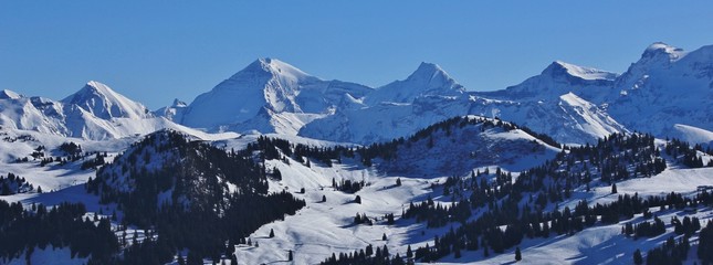 Snow covered mountain range in the Bernese Oberland