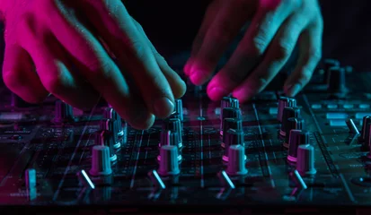 Fotobehang Muziek DJ sound equipment at nightclubs and music festivals, EDM, future house music and so on. Parties concept, sound technique. DJ playing on the best, famous CD players.  © vladimirhodac