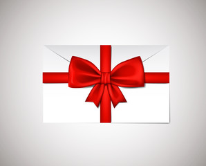 Realistic Red ribbon bow on envelope present isolated on white b