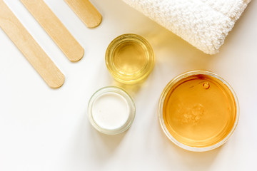 concept depilation with wax on white background top view