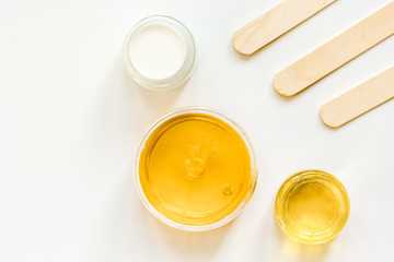 concept depilation with wax on white background top view