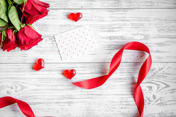 concept Valentine's Day with flower wooden background top view